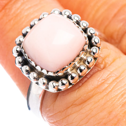 Pink opal cabochon ring with .925 sterling silver beadwork band, oval stone
