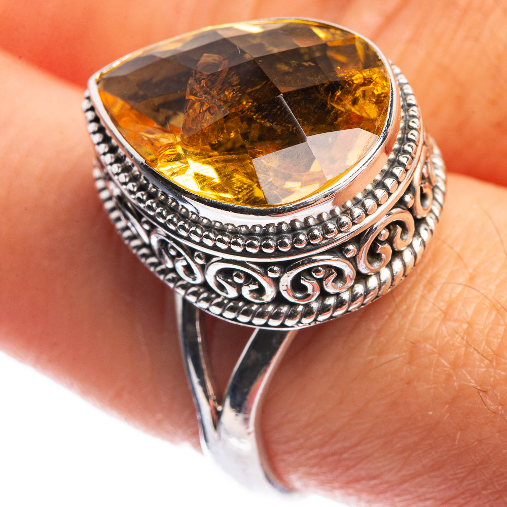 Sterling silver citrine ring with oval faceted yellow gemstone, ornate filigree band