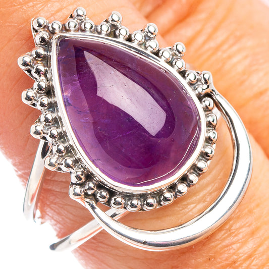 Amethyst teardrop ring in .925 sterling silver with beaded halo setting