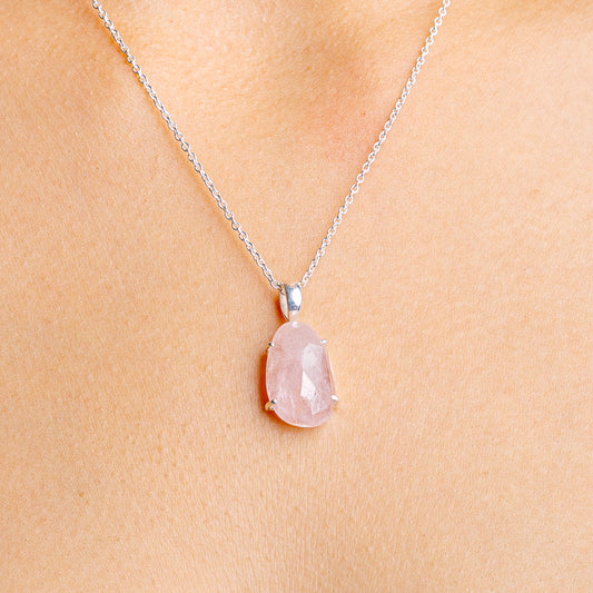 Sterling silver necklace with oval pink morganite pendant on a fine chain