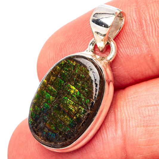 Sterling silver ammolite pendant with green-blue iridescent oval stone and bail loop