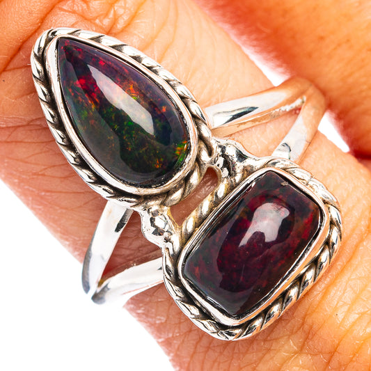 Sterling silver double-stone opal ring with dark red-green oval gemstone, size 9.5