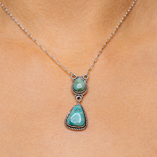 Turquoise teardrop pendant necklace with .925 sterling silver chain