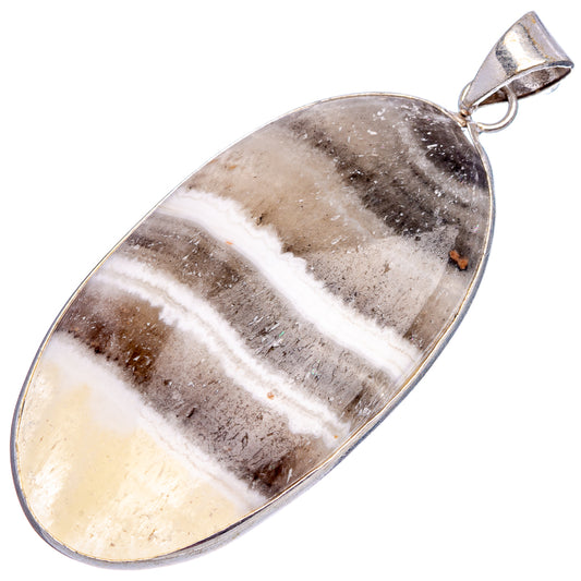 Zebra calcite pendant with silver-plated teardrop bail, striped gray and cream stone