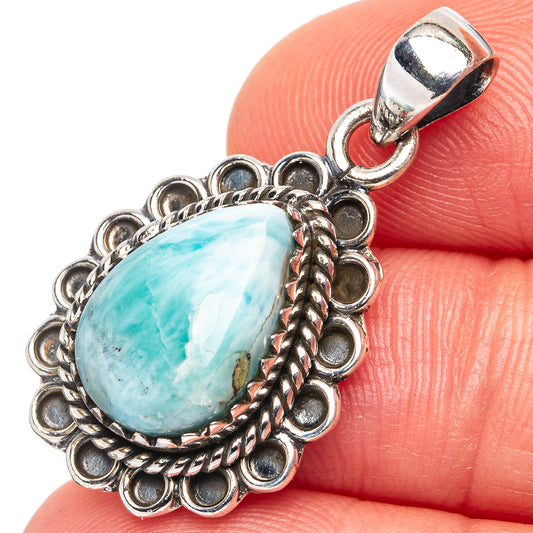 Larimar teardrop pendant in .925 sterling silver with ornate scalloped setting