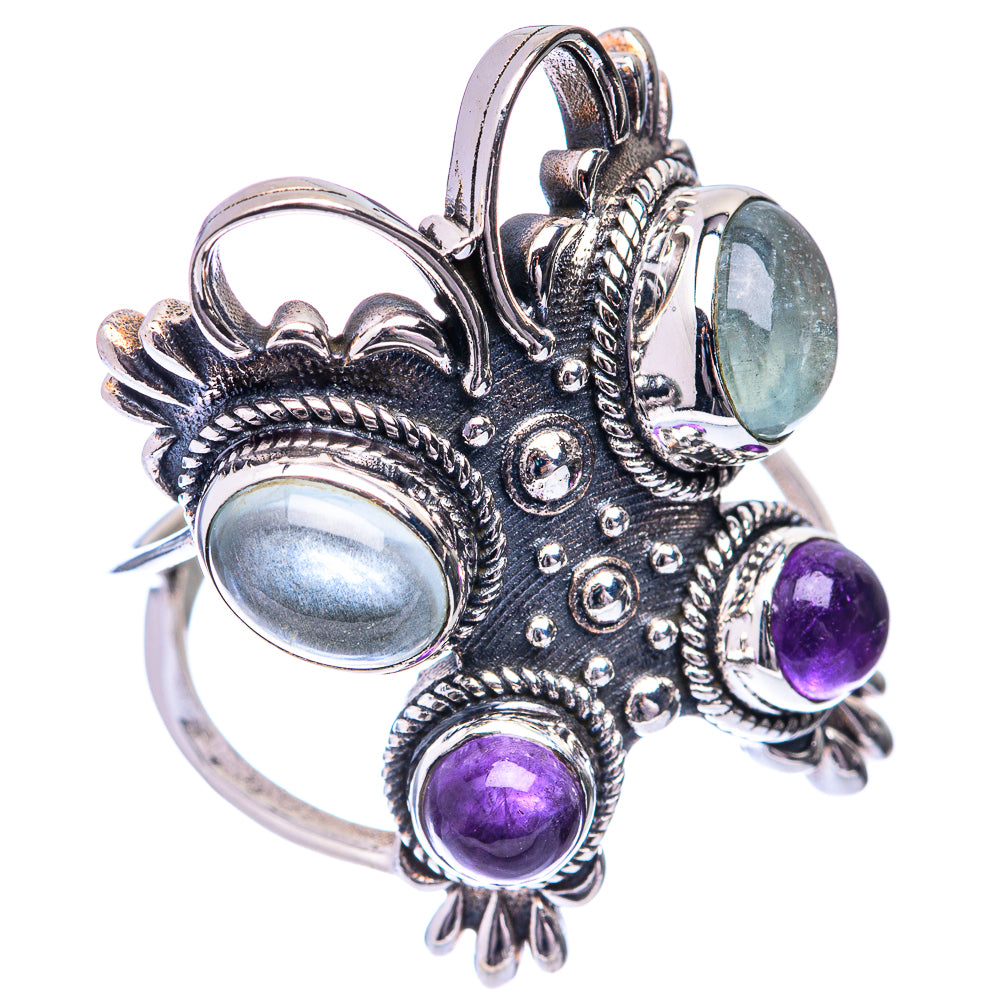 Ornate sterling silver ring with oval aquamarine and 2 purple amethyst stones, size 9.75