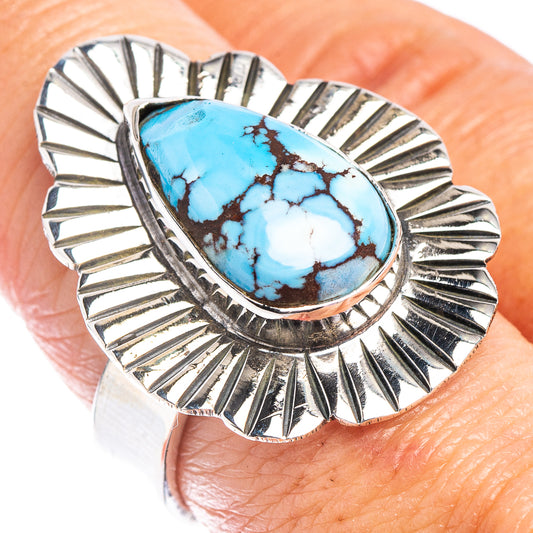 Sterling silver ring with turquoise teardrop stone and sunburst bezel