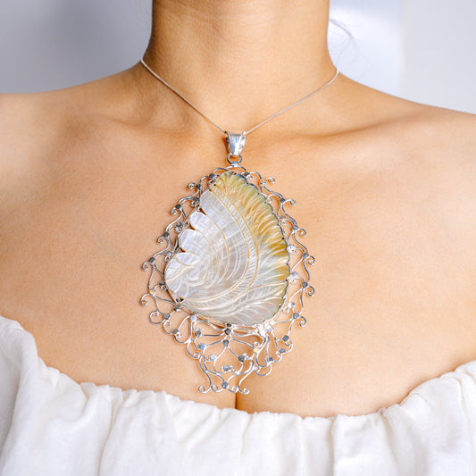 Large mother-of-pearl teardrop pendant in ornate .925 sterling silver filigree