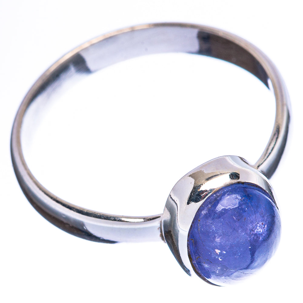 Oval blue tanzanite cabochon ring in polished sterling silver, band with round setting