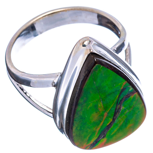 Silver ammolite ring with oval green iridescent gemstone in polished bezel setting