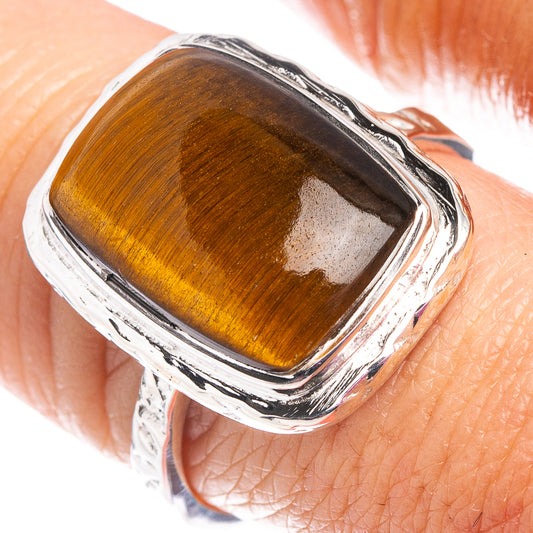 Sterling silver ring with rectangular tiger's eye cabochon, polished bezel
