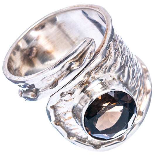 Adjustable sterling silver ring with smoky quartz oval stone and openwork metal band