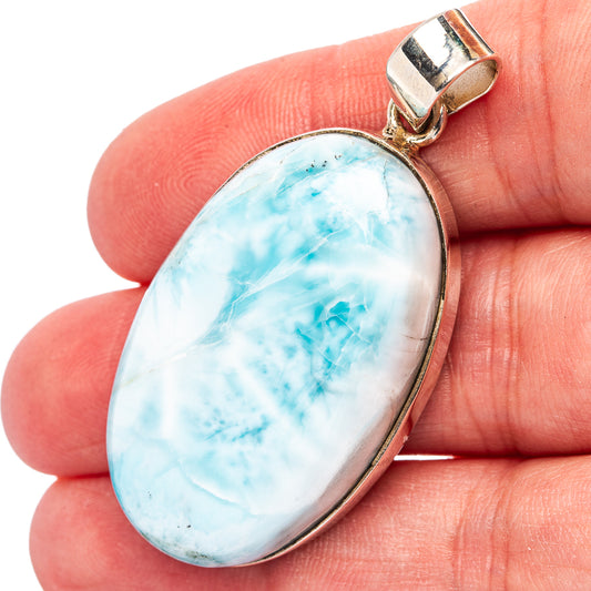 Oval larimar pendant in .925 sterling silver bezel with bail, blue stone