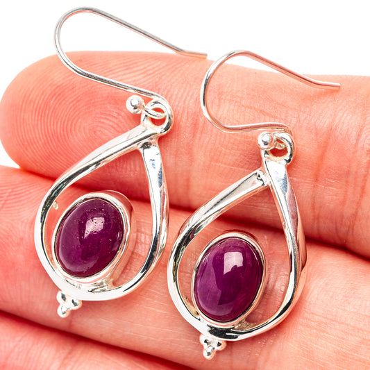 Teardrop ruby earrings in .925 sterling silver, purple gemstone with looped setting