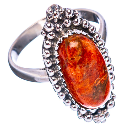 Oval sponge coral ring in .925 sterling silver with raised beadwork setting