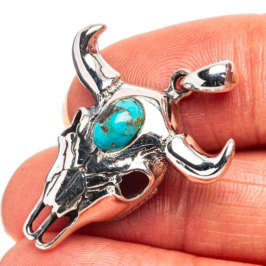 Turquoise cow skull pendant in .925 sterling silver with oval turquoise stone