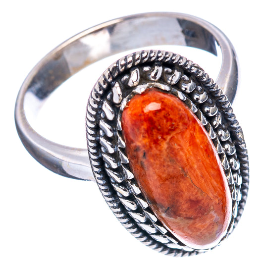 Orange sponge coral oval sterling silver ring with rope design, side view