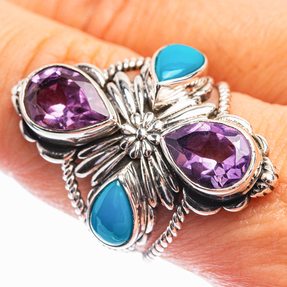 Sterling silver ring with oval amethyst centerpiece, blue turquoise side stones