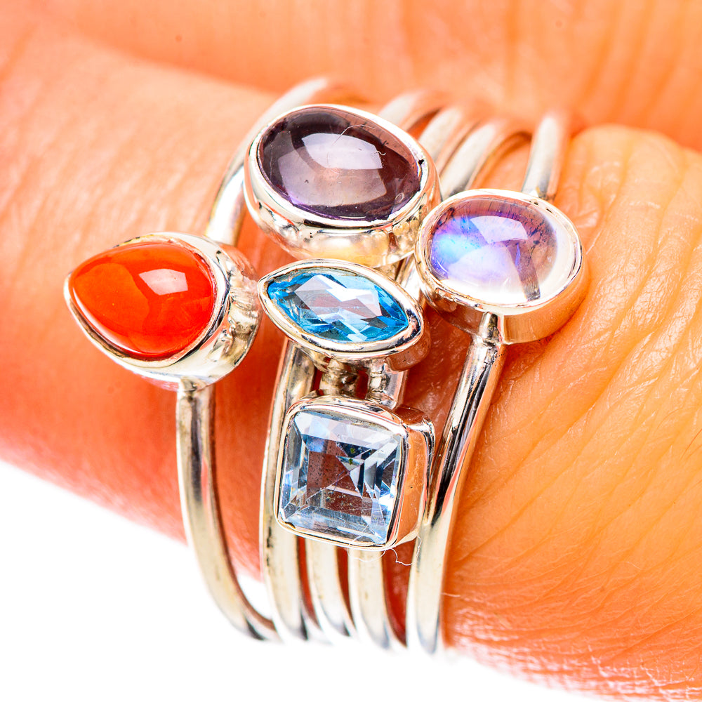 Sterling silver ring with red coral, blue topaz, tanzanite, rainbow moonstone accents