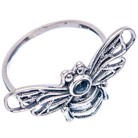 Sterling silver bee ring featuring aquamarine round stone and wing-like openwork