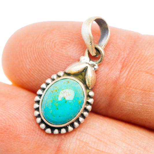 Turquoise oval pendant with silver bezel and beaded border, sterling silver bail