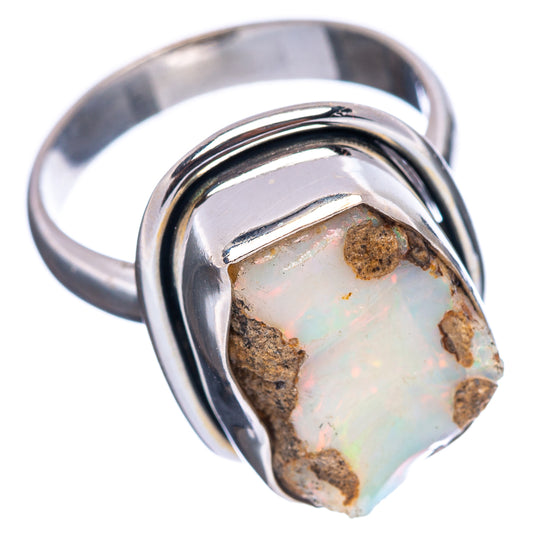 Sterling silver raw opal ring, side view of bezel-set raw opal stone