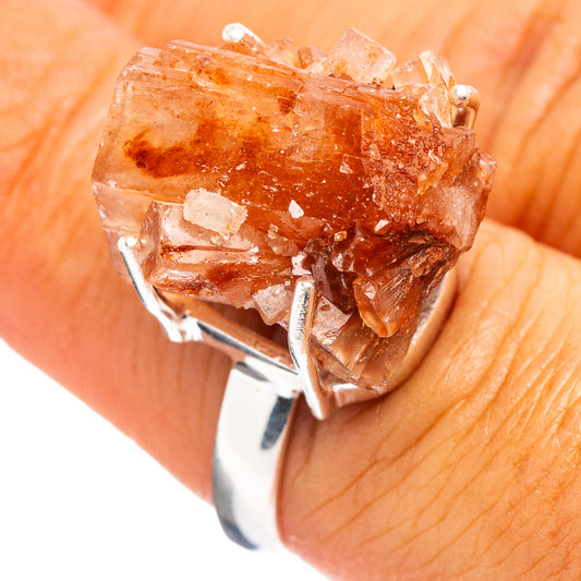 Raw orange aragonite cluster ring on .925 sterling silver band with prong setting