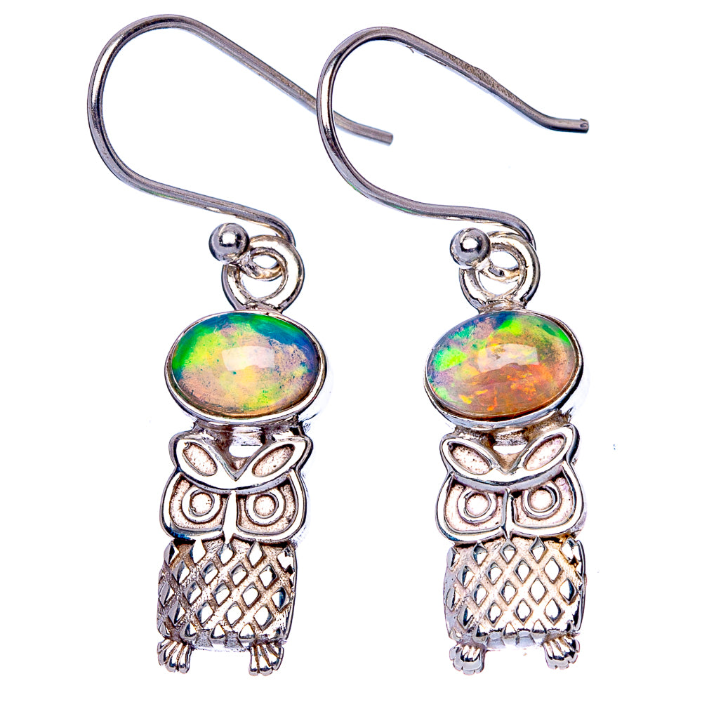 Sterling silver owl drop earrings with colorful iridescent oval stones and textured owl bodies