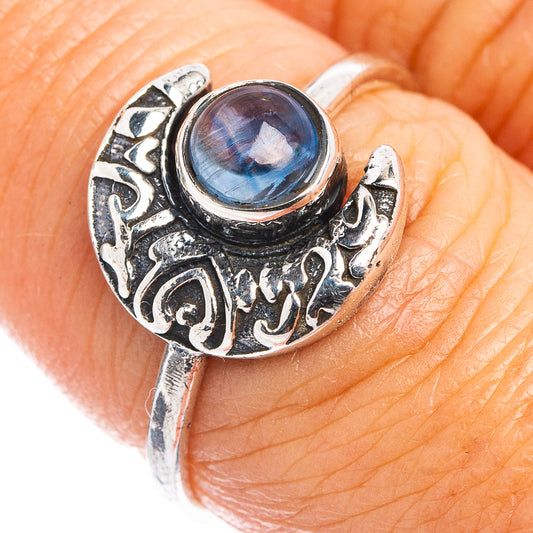 Sterling silver moon ring with oval blue kyanite-style cabochon and filigree bezel