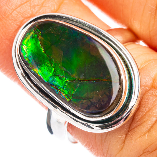 Sterling silver oval ammolite ring, green-blue iridescent stone in raised bezel