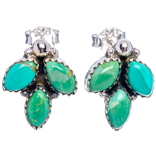 Turquoise teardrop drop earrings with silver-tone metal and four green stone accents
