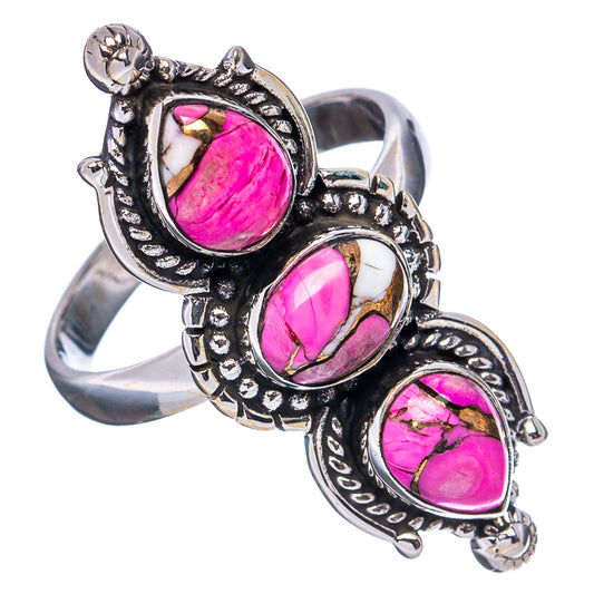 Sterling silver ring with three pink teardrop gemstone settings and ornate borders