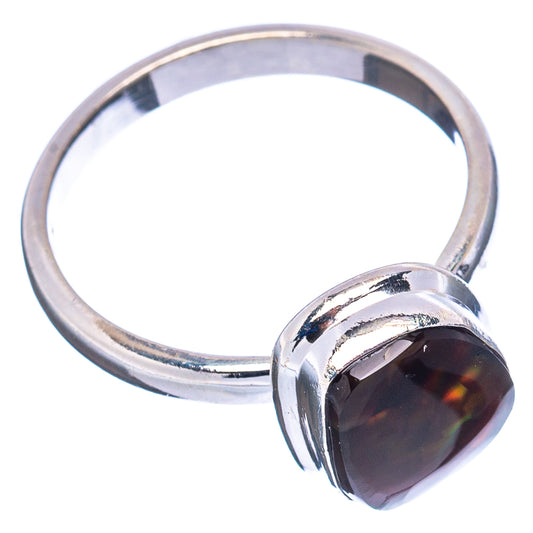 Sterling silver oval fire agate ring with dark marbled stone, side view