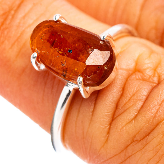 Orange kyanite oval ring with silver prongs, .925 sterling band, ring size 6.