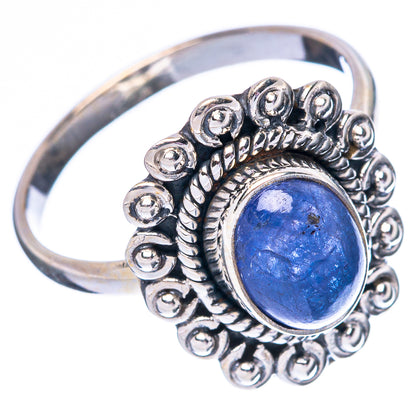 Oval blue tanzanite sterling silver ring with beaded halo and open side view