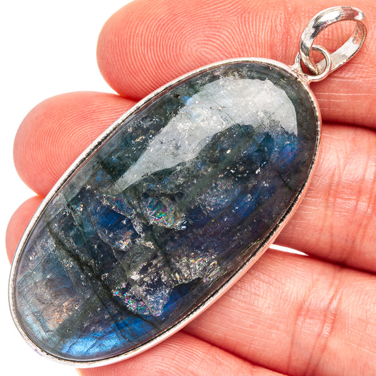 Oval labradorite pendant in silver-plated bezel with loop bail, blue flash stone