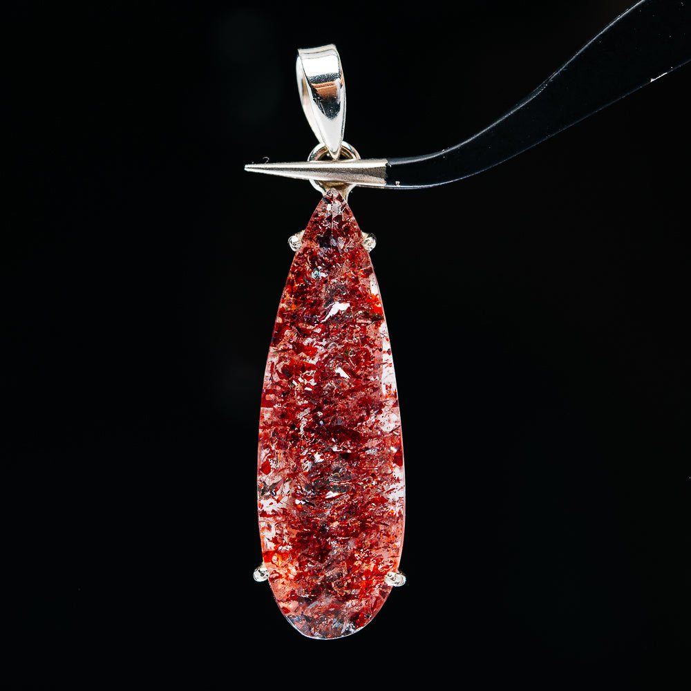 Red faceted lepidocrocite teardrop pendant with .925 sterling silver bail