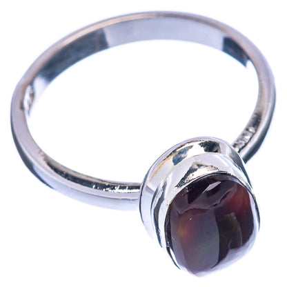 Sterling silver ring with oval dark agate bezel, high-polish silver band
