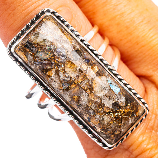 Rectangular sterling silver matrix ring with brown, gold, and iridescent stone center.