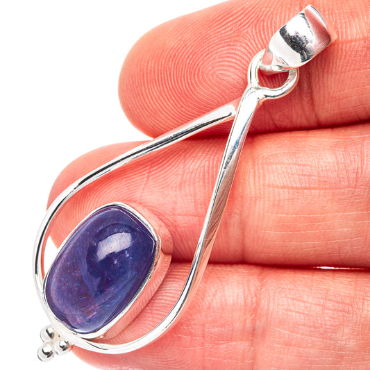 Sterling silver tanzanite pendant with oval purple gemstone in teardrop setting