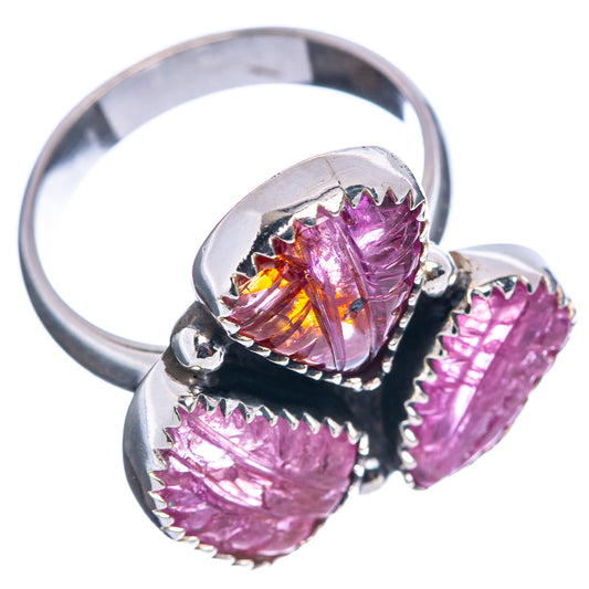 Three-stone ruby ring in polished .925 sterling silver with oval pink-purple stones, side view