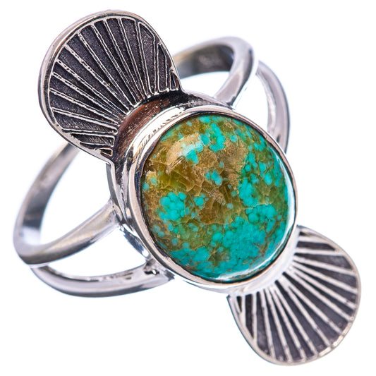 Sterling silver oval turquoise cabochon ring with decorative side panels, size 9
