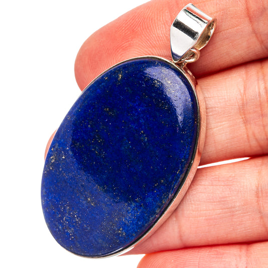 Lapis lazuli pendant, oval blue gemstone with sterling silver top bail and bezel