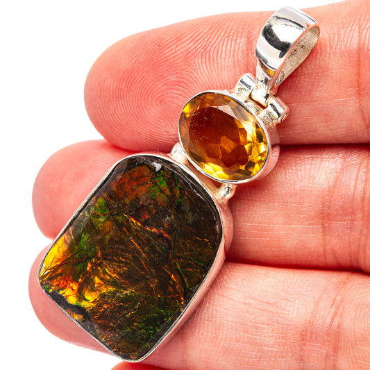 Citrine yellow and multicolor ammolite pendant in sterling silver, close-up on bail