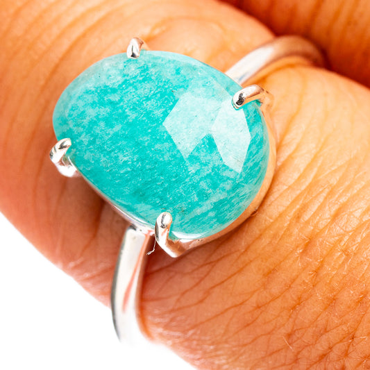 Sterling silver ring with teardrop-cut turquoise-blue amazonite stone, prong setting.