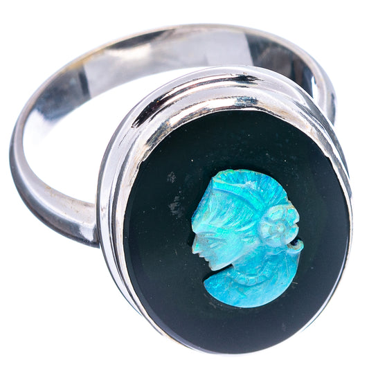 Sterling silver opal cameo ring with blue carved opal in black round bezel, side view