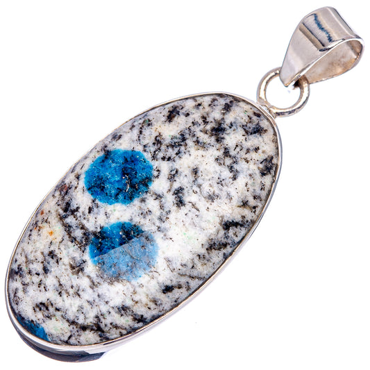 Sterling silver oval pendant showing blue azurite clusters in speckled white stone