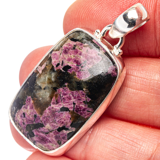 Oval eudialyte pendant in .925 sterling silver, purple and dark stone cabochon