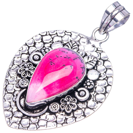 Silver-tone heart-shaped teardrop opal pendant with pink dendritic center and bail loop