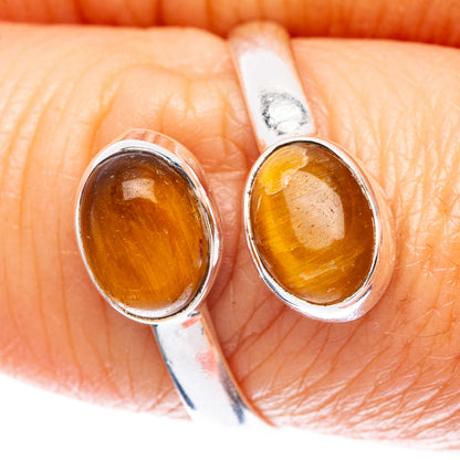 Double oval tiger eye ring with warm amber-brown stone in sterling silver